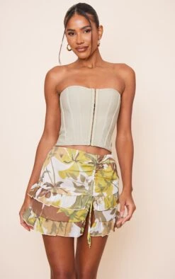 Green Floral Printed Woven Tie Side Frill Mini Skirt 11 Green Floral Printed Woven Tie Side Frill Mini Skirt -Women Clothing Shop 7cfae65922f42db4f1e7c6057189406cc824aa53 cnd9250 4