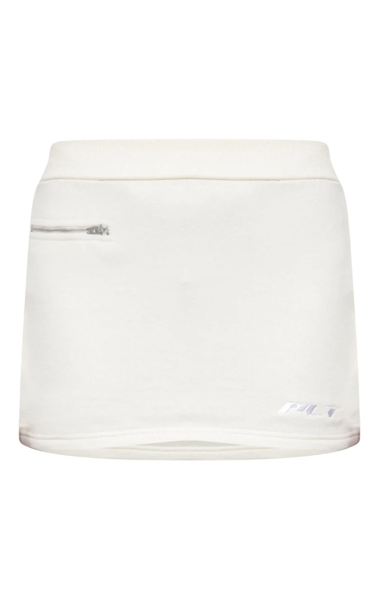 PRETTYLITTLETHING Cream Logo Print Detail Low Rise Micro Mini Skirt 8 PRETTYLITTLETHING Cream Logo Print Detail Low Rise Micro Mini Skirt - Image 6