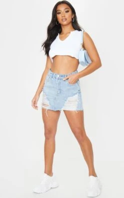 Petite Light Blue Wash Ripped Mini Denim Skirt